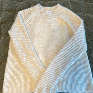 Soft, oatmeal colored cozy sweater by Evereve